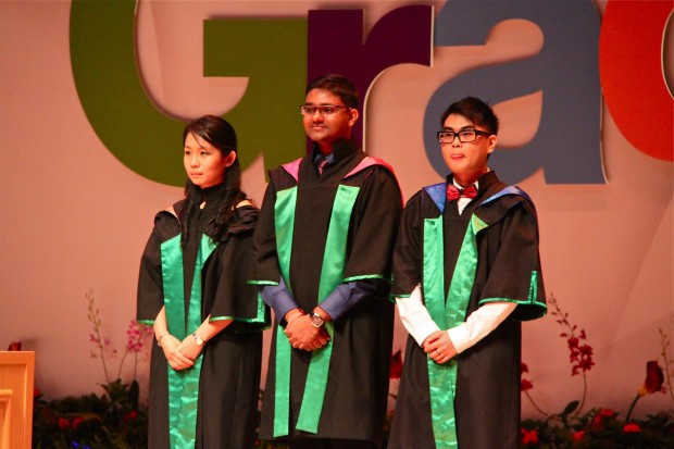 TOP GRADS: Phoebe Yew, Piragathesh and Xavier Tan on stage on day one. "It is important that we find something that motivates us because it gives us a goal," said Phoebe.