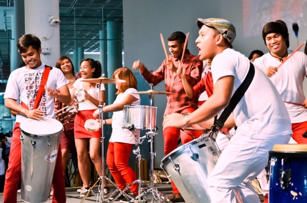 RED AND WHITE: Beats Encore IG livened the atmosphere as they started the ball rolling for National Day celebrations in RP. (Photo: Lee Quanta)