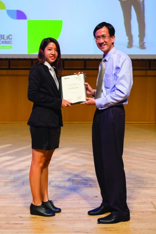 FIRST AWARD: Jolene Soh Yen, one of the six to get the new PFP Scholarship from Mr Heng Guan Teck, deputy principal, RP. Throughout August and September, a total of 250 scholarships, 143 bursaries, 84 diploma prizes and 178 module prizes will be given out.