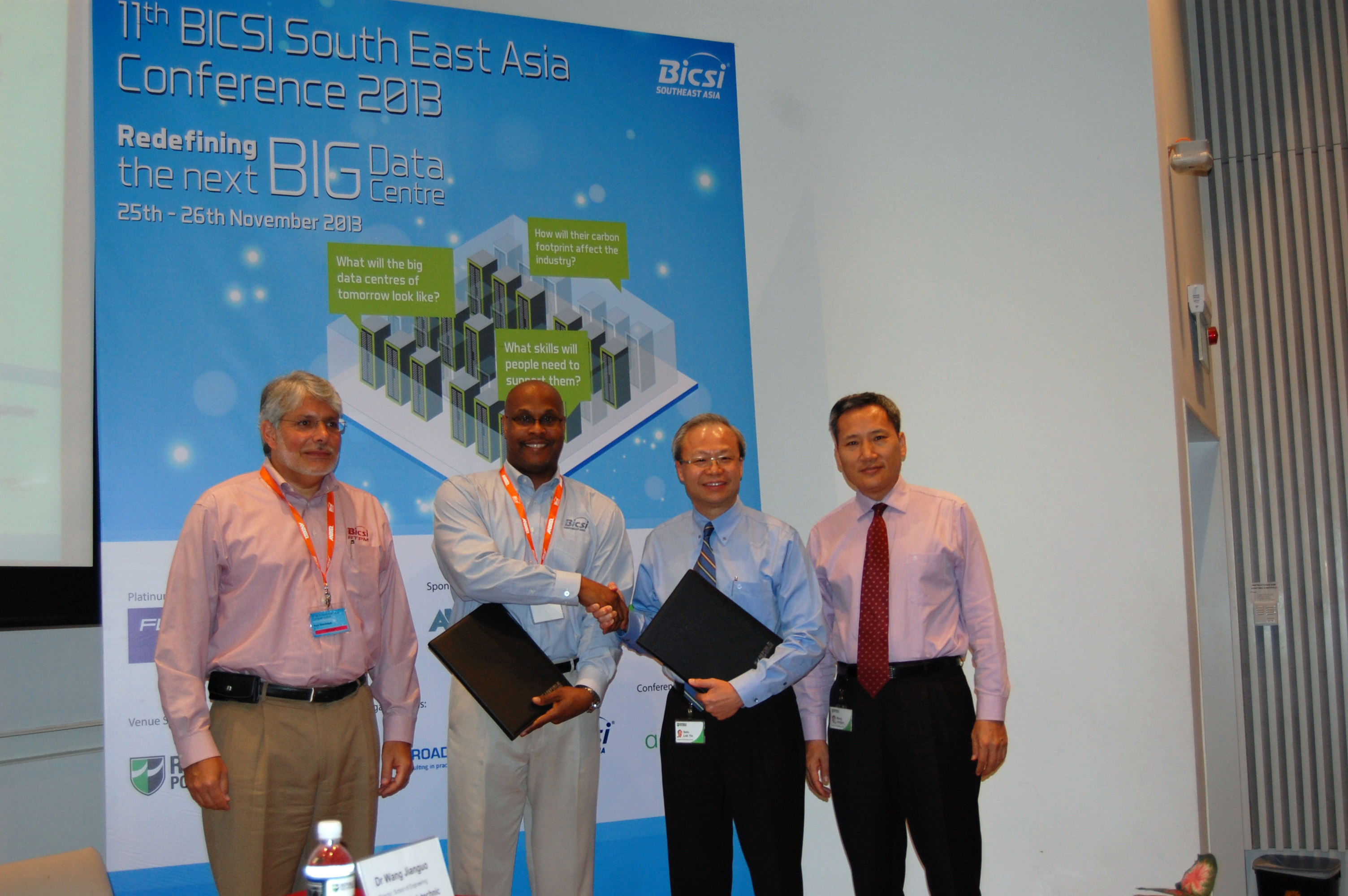 SEALED AND DELIVERED: Mr Seto Lok Yin (second right), RP’s Deputy Principal, Industry Services, exchanges a handshake on the partnership with Mr Michael A. Collins, President-Elect, BICSI. The signing was witnessed by Mr Paul Weintraub, BICSI’s Director of Global Development & Support (far left) and Dr Wang Jianguo, Director, School of Engineering, RP. (Photo: Veknesh Rajasekaran)
