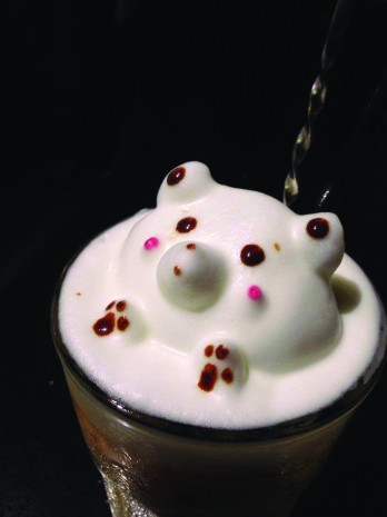 3D LATTE ART: A teddy bear pops out of this coffee mug. (Photo: Chock Full of Beans Facebook)