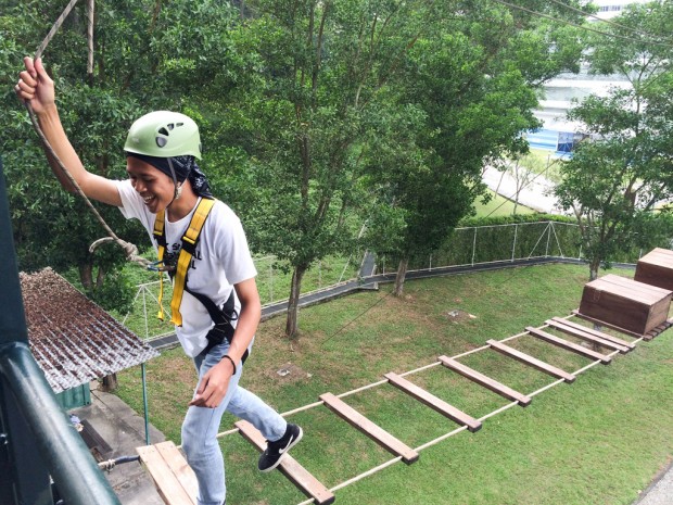 WALKING ON AIR: Indonesian scholar Eduardus Adi Prayoga, 22, from the State Polytechnic of Malang, completes the course with a smile. (Photo: Kane Raynard Goh)