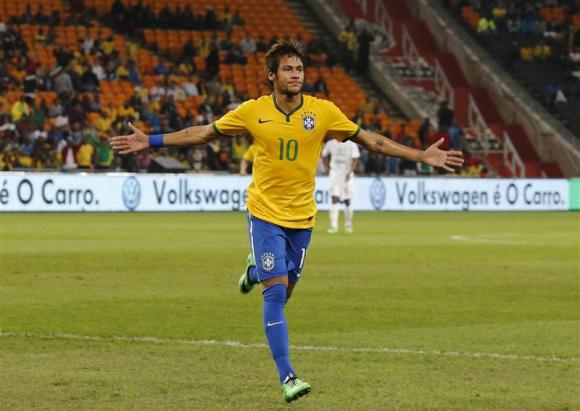 Brazil's Neymar celebrates his goal against South Africa during their international friendly soccer match at the First National Bank (FNB) Stadium, also known as Soccer City, in Johannesburg