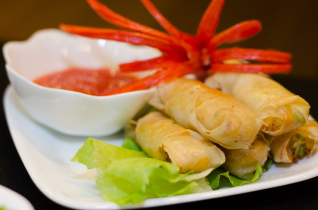 VOILA! Spring rolls served as an appetizer are presented by  finalist Team C&K. Spring rolls are filled most commonly with stir-fried vegetables, includes red carrot, cabbage and the Chinese “Mang Kuang” served with condiment dipping of chilli sauce. (Photo: Marcus Benedict Tan)