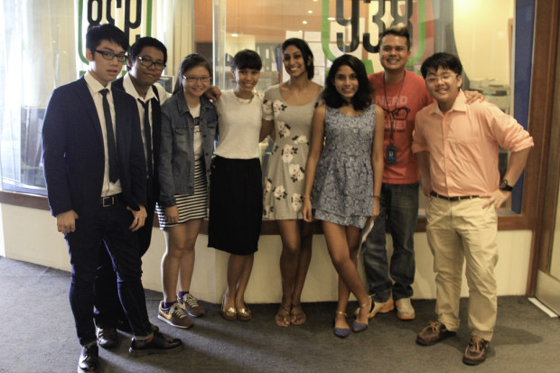 PLAYING HOST: Radio personality Daniel Martin (2nd R) poses with Speakers IG team at the 938Live recording studio. (Photo: Ken Lu)