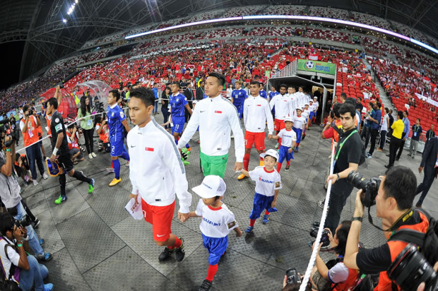 READY TO ROAR - The Lions walk out onto the pitch ahead of their opening clash against Thailand. (Photo: http://www.affsuzukicup.com/)