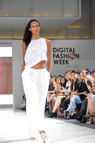 Walk the talk: Models strut their stuff confidently down the catwalk in Pauline Ning’s latest designs (Photo By: Tristan Loh)