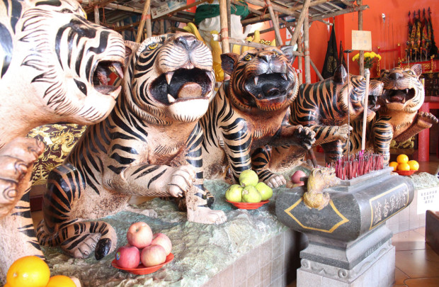 GUARDIAN ANGELS: Like the Five Tigers, Taoists worship these five deities for protection against backstabbers getting in the way of good fortune. An incense stick must be offered to each deity as a form of respect. (Photo: Emmanuel Phua)