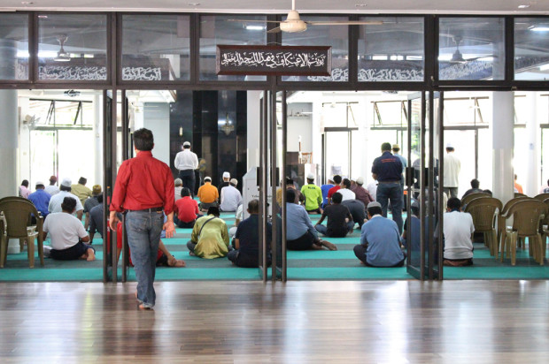 AN APPORTIONED PRAYER: The mosque provides separate prayer areas for both genders. Men are given the ground floor while women partake in their prayers a level above. (Photo: Emmanuel Phua)