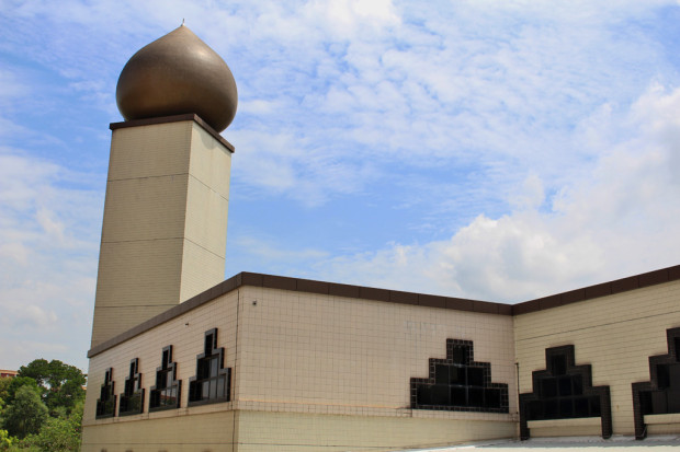 KEY TO RELIGION: Opened on 25th July 1987, Darul Makmur Mosque is the mosque to be built in Yishun New Town. It is a key destination for Muslims who crowd its complex for their Friday prayers. (Photo: Emmanuel Phua)