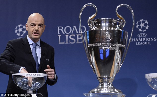 Berlin Bound: UEFA general secretary Gianni Infantino picking the draw for the  round of 16.  (Photo by Getty)