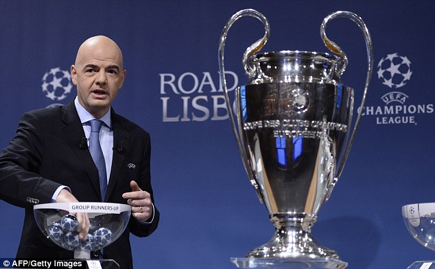 Berlin Bound: UEFA general secretary Gianni Infantino picking the draw for the round of 16. (Photo by Getty)