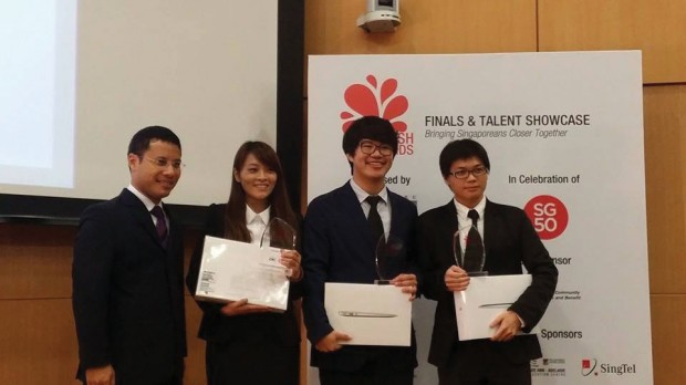 Lucky number three: The team receives their award from National Development Minister Desmond Lee at the Splash Awards 2014. (Photo: Fang Ling Qing)