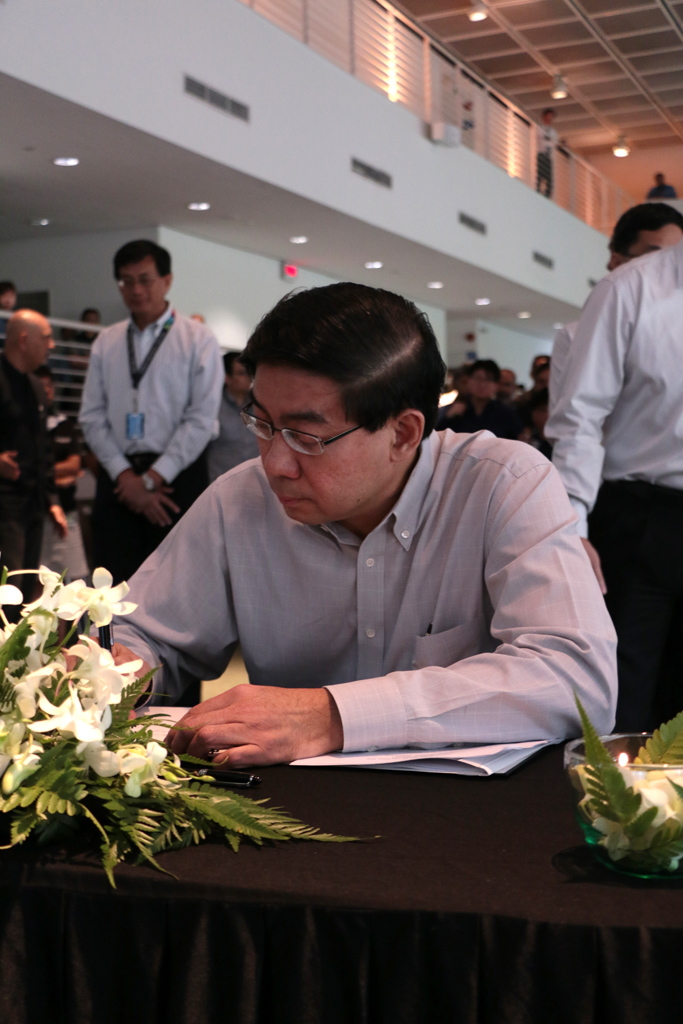 PENNING HIS THOUGHTS: RP Principal, Mr Yeo Li Pheow, was the first to write his condolences to the family of the late Mr Lee. (Photo: Azmi Athni)