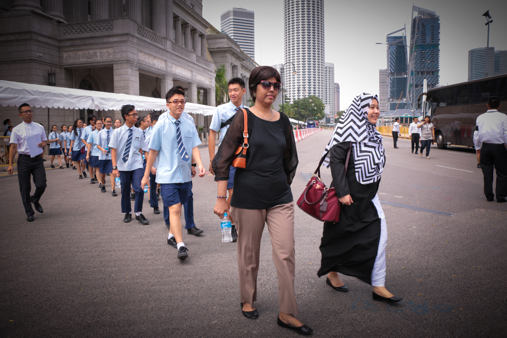ONE HEART: Teachers and student council representatives from East View Secondary School make their way to the Parliament House. (Photo: Azmi Athni)