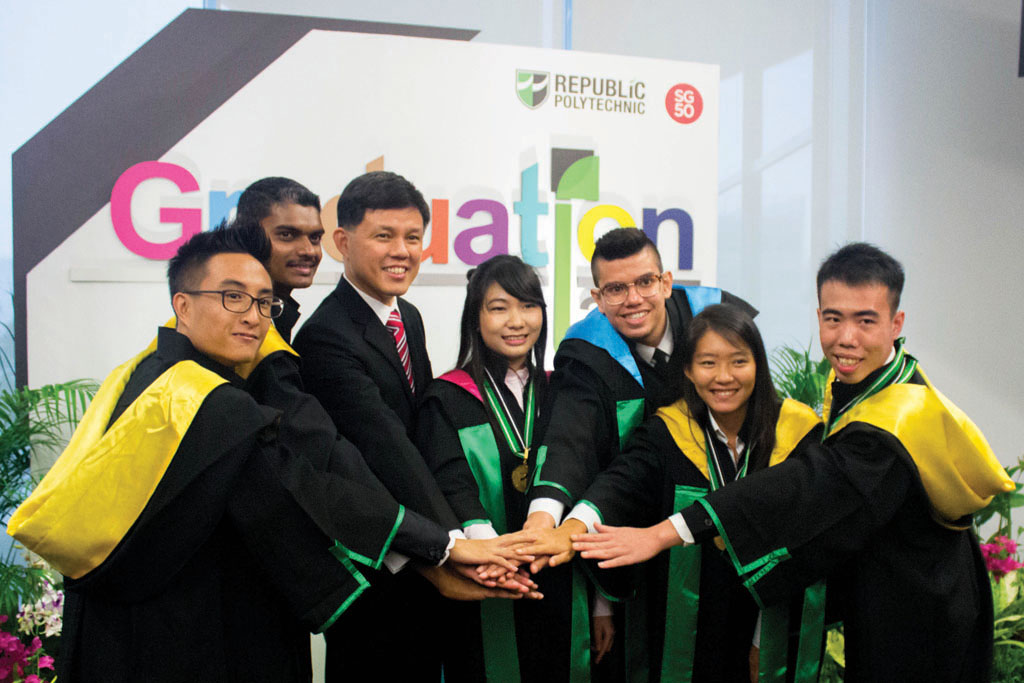ONE RP: (From left) Special Award Winners Chan Wei Zhang, Francis Miranda, Ye Mon Soe, Muhammad Imran, Pan Shi Yu and Lim Shunyong had the opportunity to mingle with the Minister from the Prime Minister’s Office Mr Chan Chun Sing after their graduation ceremony.  Photo: Nur Hidayah Roslan 