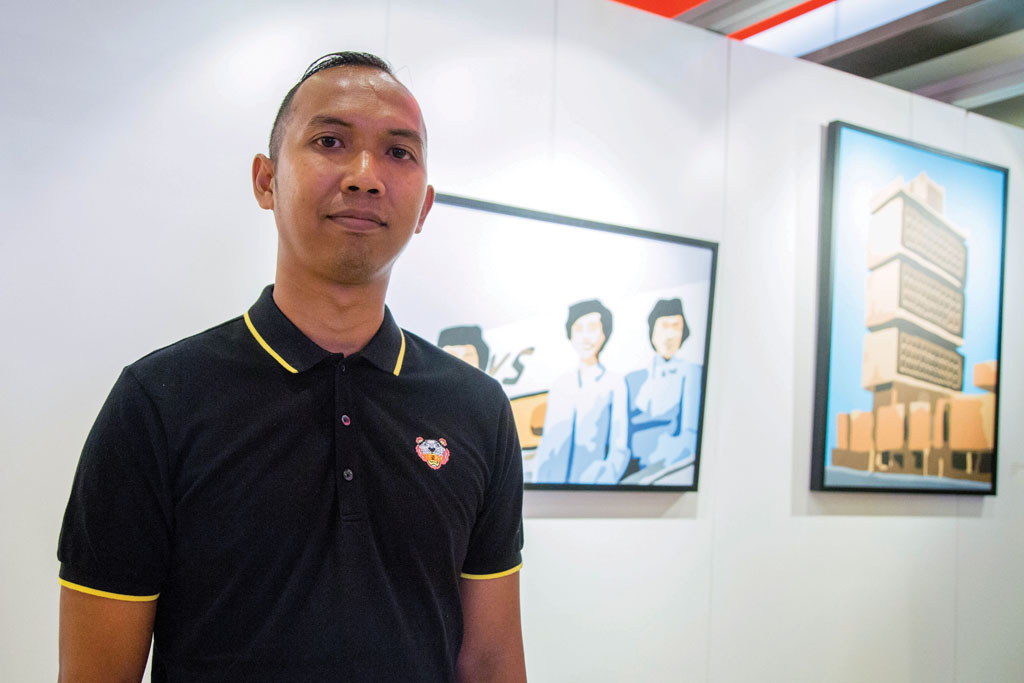 PASSION BECKONS: Having been inclined towards drawing ever since a kid, it has been almost 13 years since Mr Safaruddin Abdul Hamid started painting. Plans to become an accountant or a soldier did not work out, as he soon realised that doing art for a living was what he enjoyed.  PHOTO: OCBC Bank/Vincent Ng