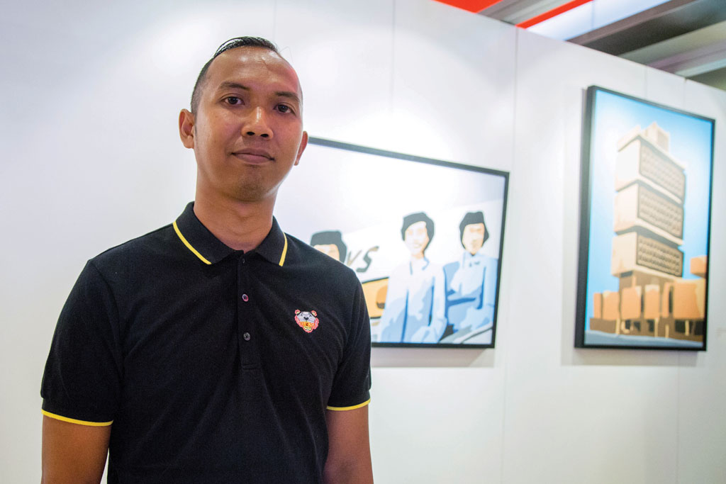 PASSION BECKONS: Having been inclined towards drawing ever since a kid, it has been almost 13 years since Mr Safaruddin Abdul Hamid started painting. Plans to become an accountant or a soldier did not work out, as he soon realised that doing art for a living was what he enjoyed. PHOTO: OCBC Bank/Vincent Ng