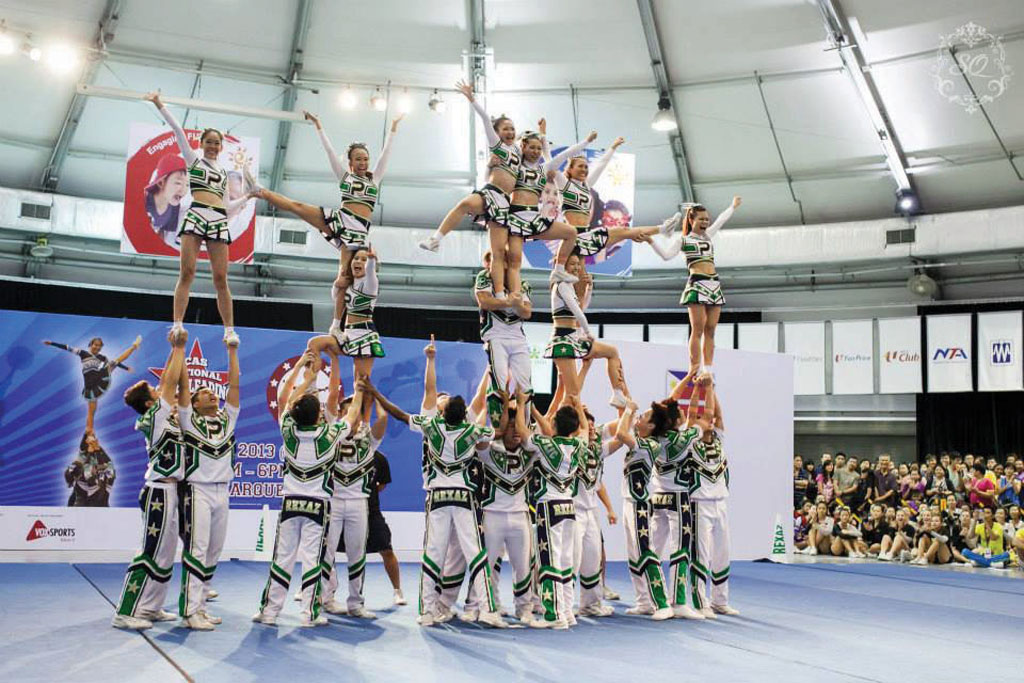 CHAMPIONS: Rexaz Cheerleading Squad at the 2013 CAS National Cheerleading Championships (CASNCC). PHOTO COURTESY OF: CHEERLEADING ASSOCIATION SINGAPORE FACEBOOK