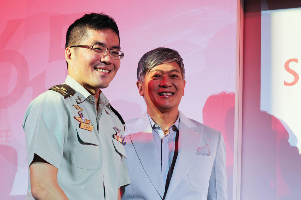 KEY MEN IN NDP 2015: Dick Lee (right) composer of “Home” and “Our Singapore” with Brigadier-General Melvyn Ong, Chairman of the NDP 2015 Executive Committee. Photo: Natalie ann fernandez