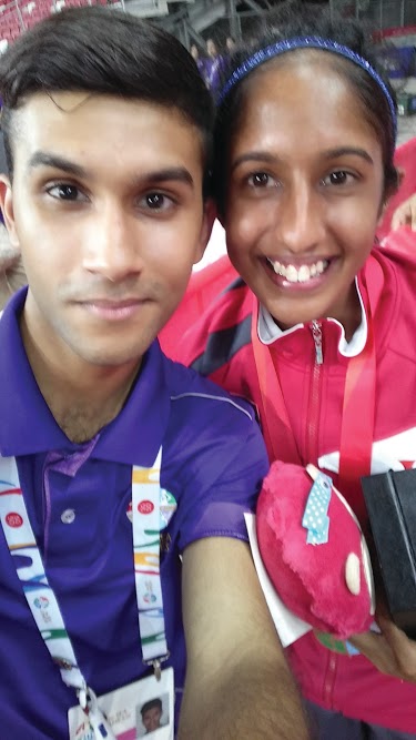 SELFIE WITH SHANTI: Davinder Singh with Shanti Pereira after her 100m bronze medal podium finish. Shanti went on to clinch the gold medal for the women’s sprint 200m sprint final the following day. PHOTO: Davinder Singh