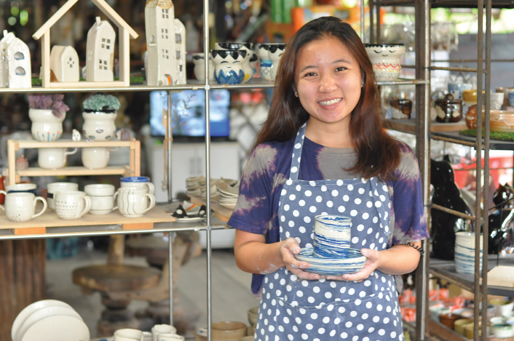 ART WITH A HEART: When her dog died, Miss Stella Tan found solace in pottery and crafted the sky-blue cup and saucer as she believed her dog went to Heaven in the skies. (Photo: Karl Lim)