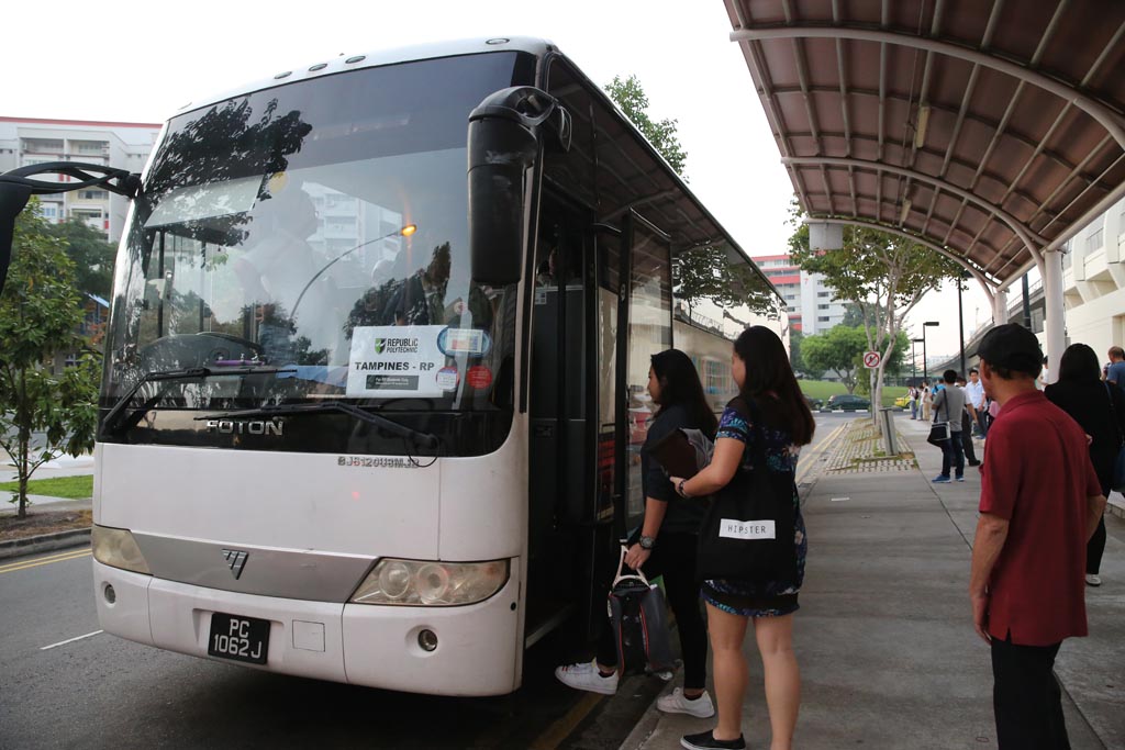EARLY BIRDS FROM THE EAST: With shuttle bus services being offered at Tampines and Sengkang, students who have always had issues waking up early and/or being punctual for class can now conveniently take these buses at their area’s respective pick-up points to school. (PHOTO: CELESTA LOH)