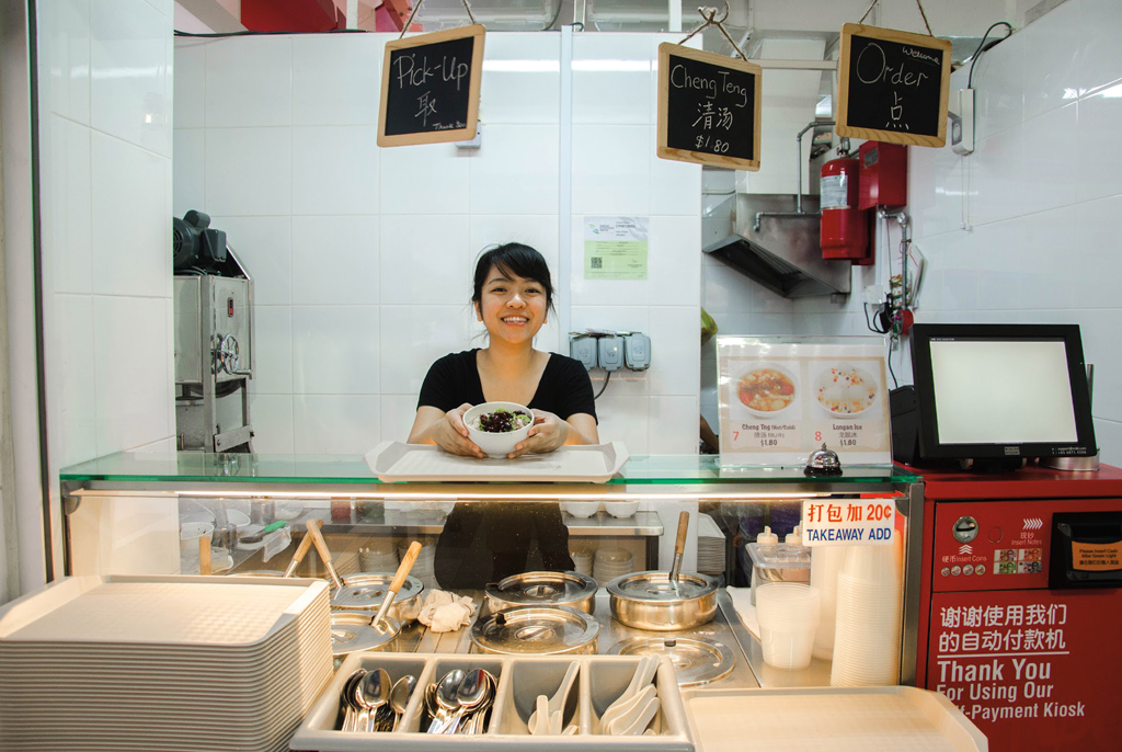 Caption: From diploma to desserts: 23-year- old Aericurl Chng’s aim was to do her bit to preserve the hawker culture. She has patronized hawker centres since young with her mother who worked in the F&B line.
