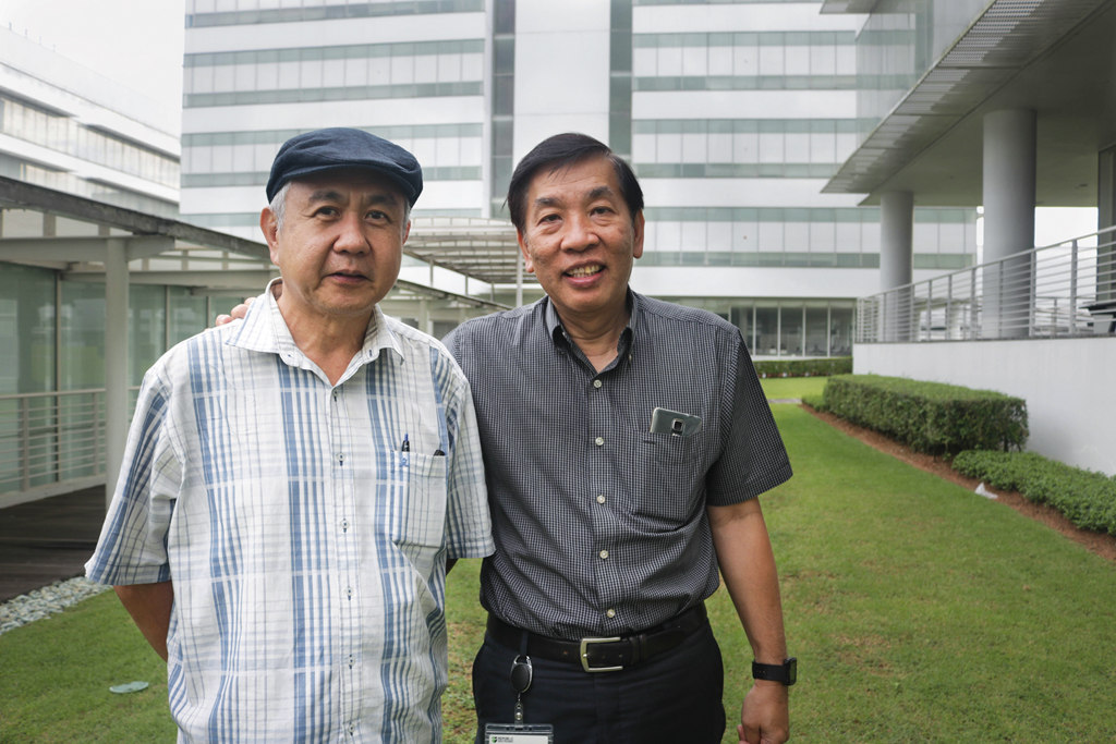 AWE-INSPIRING: Lecturer Julian Wong (right) is proud of his mentee Patrick Goh (left) as he understands how difficult it must have been for Patrick to adapt to all the new changes in school at the age of 60. (PHOTO: NUR KHALISA BTE MOHAMED SANI)