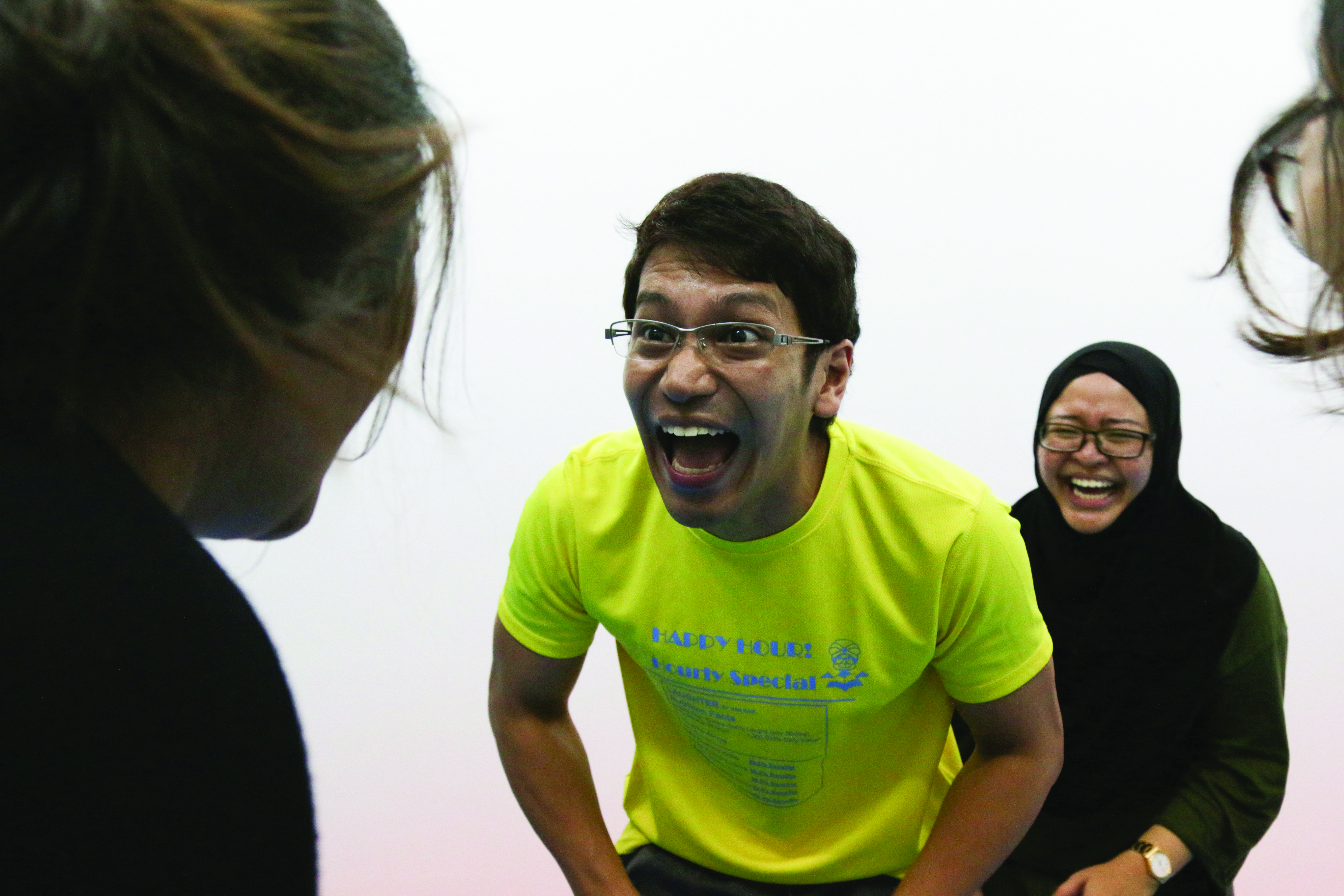LAUGH OUT LOUD!: A group of third-year Mass Communication students tried the Laughter Yoga Therapy with Guru Van Ram. The program is intended to give participants a workout while changing their mindsets. PHOTO: Hasif Hasny