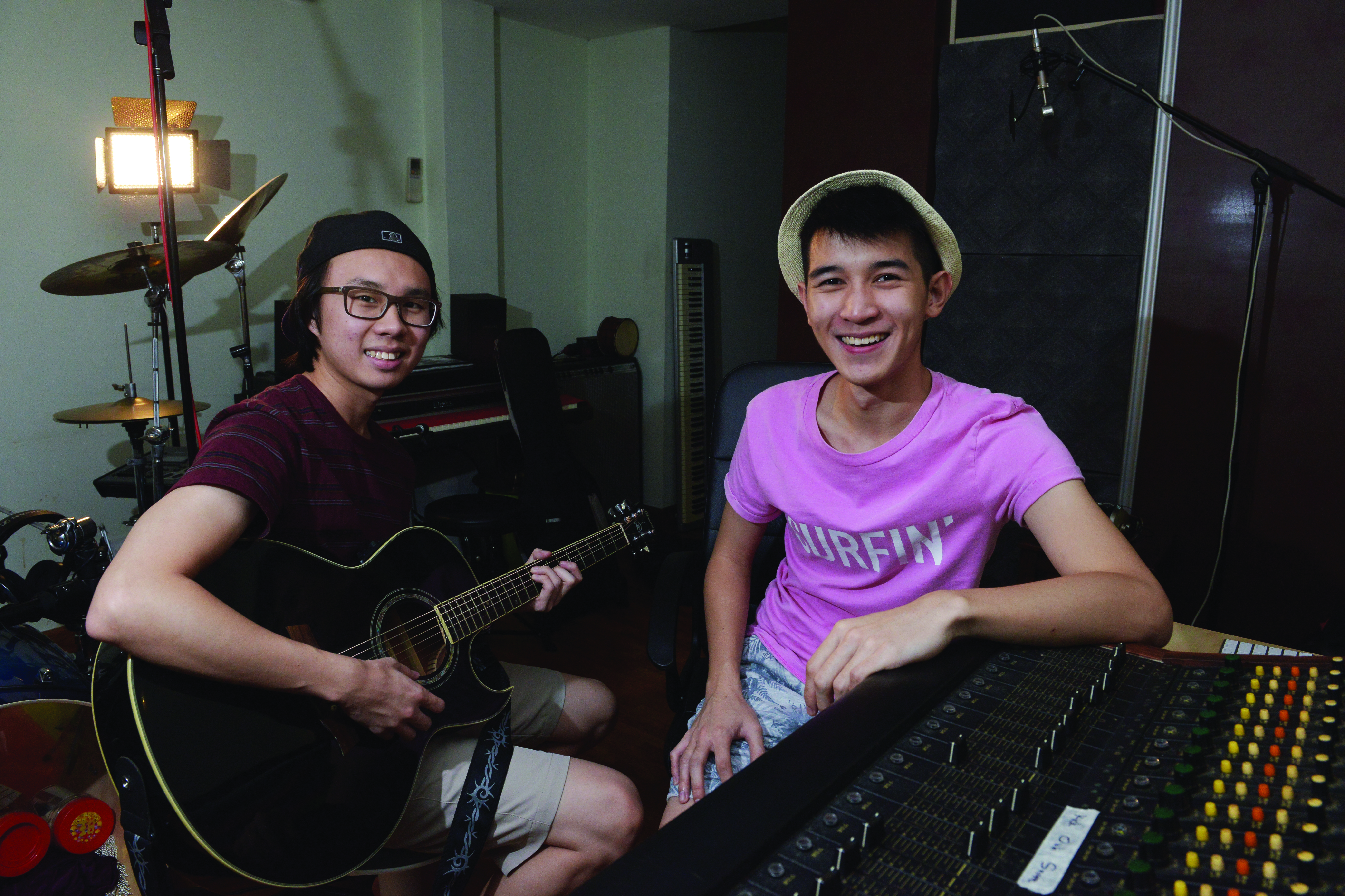 FROM FRIENDSHIP TO PARTNERS: Glen Wong, 20, (left) first worked on a music video with Jerry Galeries, 20, (right) in 2014. Glen recently recorded his first album, 'Your Story and Mine', at Jerry's home studio earlier this year. PHOTO: Marcus Tan