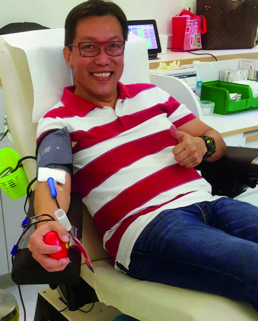 STARTED YOUNG: Derrick Lau, 54, has been working in Republic Polytechnic for six years and has donated blood regularly for 34 years. Photo Courtesy of Derrick Lau
