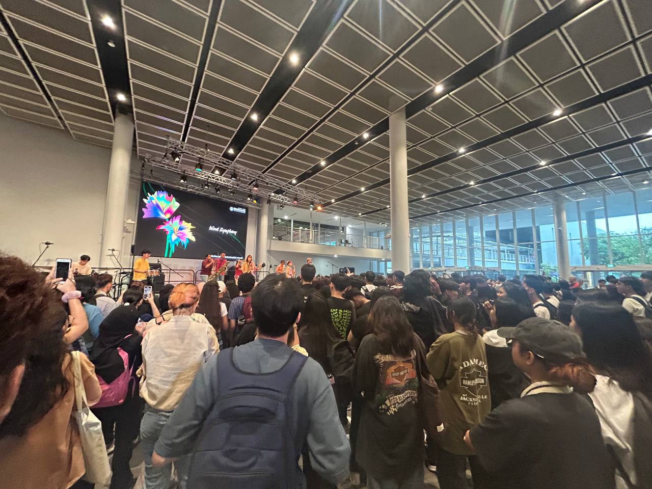 Reflections Arts Festival 2023 featured image. Students crowding around South Agora stage for festival launch